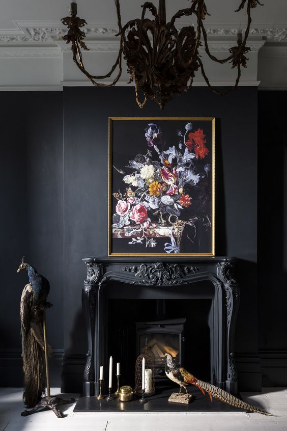 hanging an artwork over the mantel or placing it right on it is a traditional idea