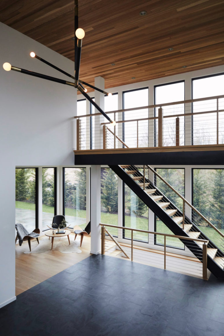 There are two rows of large windows that bring much light inside and let enjoy the views