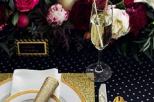 07 a tablescape with a lush floral garland, gold glitter touches, a polka dot tablescape and sparkly drink stirrers