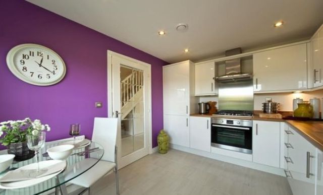 add a trendy feel to your kitchen making a violet statement wall