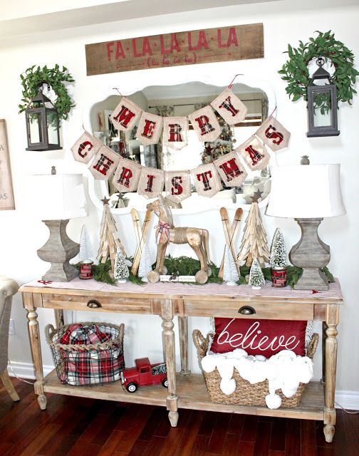 plaid red garland, a matching basket and a red sign to add vintage rustic chic