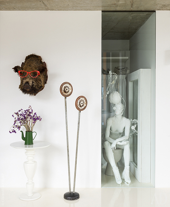 Sculptures and faux taxidermy can be seen throughout the space