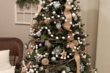 08 a chic Christmas tree decorated with silver snowflakes, pompoms, pinecones and burlap ribbons