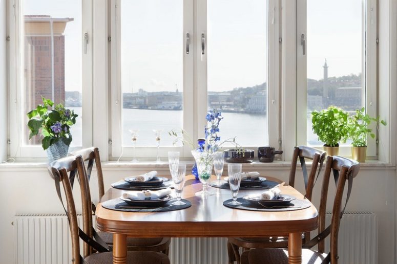 Here you'll see a vintage wooden dining set and cool views - in case it's cold outside, it's cool to dine here