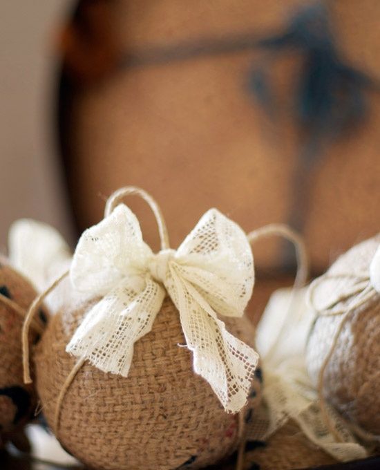A burlap ornament with a lace bow is a cute vintage inspired and rustic decoration
