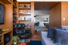 10 There’s a TV and shelves plus a sofa, a coffee table – this is a small lounge zone