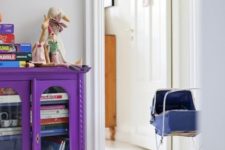 11 a bold violet bookcase placed right on the floor is a cool idea for any space
