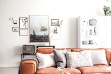 11 an apricot-colored faux leather sofa looks chic, modern and vivacious plus adds a colorful statement