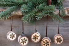 11 cute wood burnt snowlflake ornaments look rustic and very cute