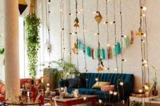 12 a curtain of string lights can be a nice idea to add some light to the interior and divide it into zones