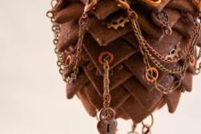 13 a leather Christmas ornament with lots of gears, keys and chains will look really bold