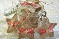 15 little burlap star ornaments with plaid bows and star buttons for a cute rustic tree
