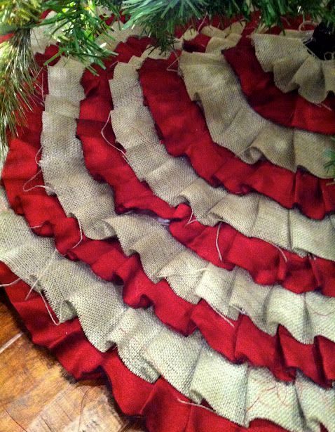 A red satin and burlap pleated Christmas tree skirt looks fun and cute