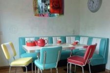 19 a dining zone in turquoise, red and yellow in the corner of the kitchen