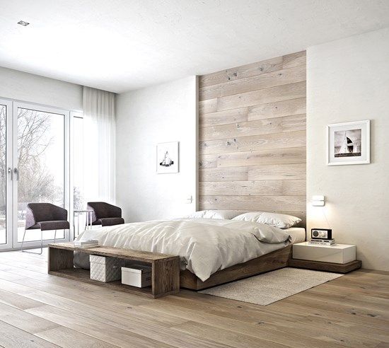 white walls are spruced up with a wood clad headboard and matching floors