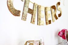 20 a gold sequin letter garland for decorating any space at home