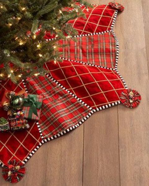 a red velvet and plaid Christmas tree skirt is all you need for a chic and cozy look