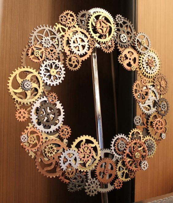 a gorgeous metal gear steampunk wreath is what you need for unique space decor