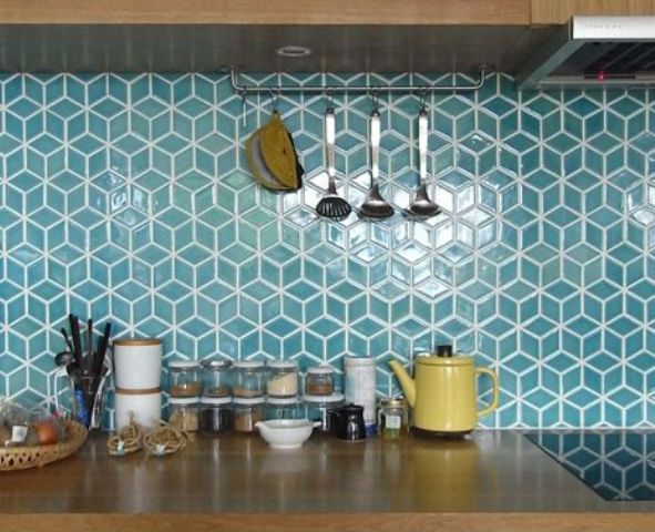 Green geo tiles with white grout for a mid century modern kitchen