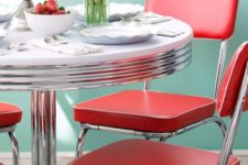 23 red retro chairs and a diner-styled round table are ideal for adding a retro feel to your space