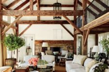 23 rich-colored wooden beams here add dimension and coziness to the space
