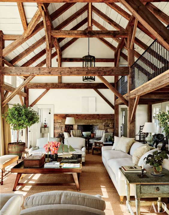 rich-colored wooden beams here add dimension and coziness to the space