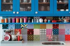 24 a bold blue kitchen with super colorful tiles of all kinds but the same size
