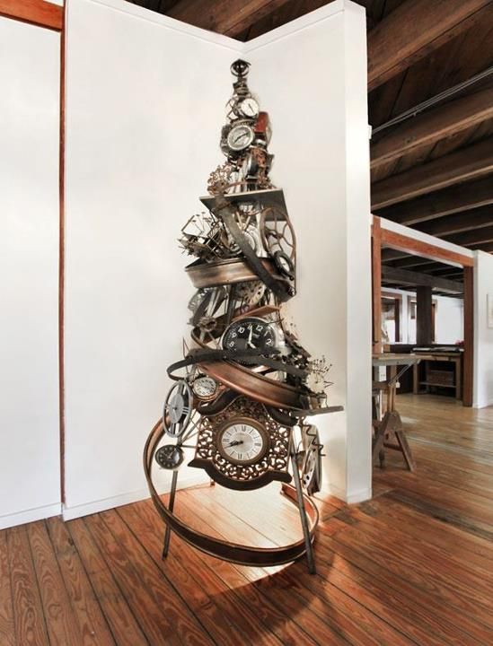 a unique steampunk Christmas tree with clocks, gears and metal elements looks just jaw-dropping