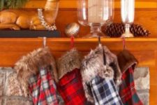 25 colorful plaid stockings with faux fur are what you need for a cozy winter mantel