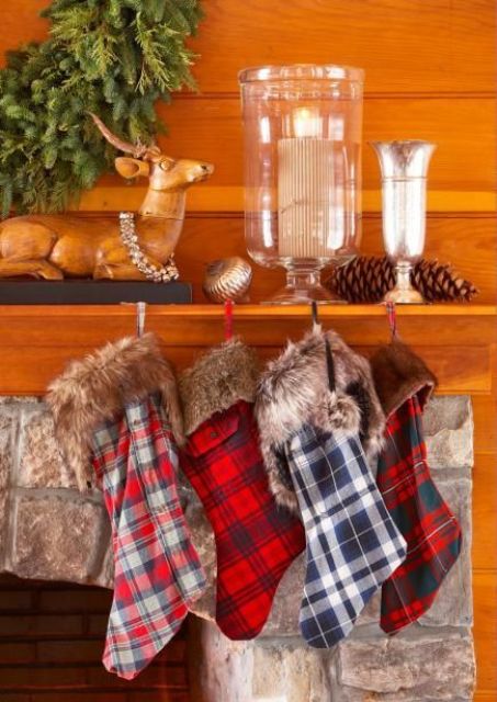 colorful plaid stockings with faux fur are what you need for a cozy winter mantel