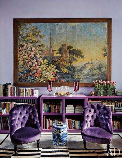 violet upholstered chairs and a matching bookshelf for an exquisite space