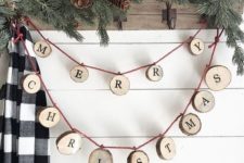 26 a wood slice letter garland can decorate any space, from an entryway to a living room