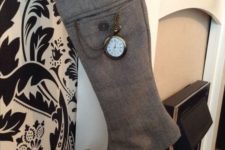 26 decorate large grey stockings looking like men elves’ ones with vintage pocket watches