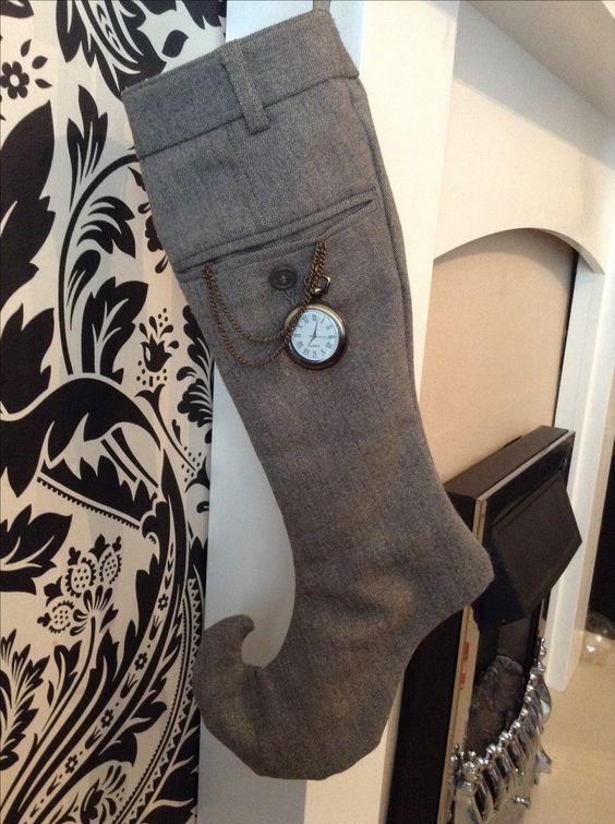 decorate large grey stockings looking like men elves' ones with vintage pocket watches