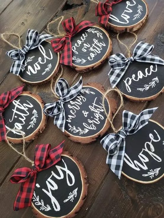 chalkboard wood slice Christmas ornaments with bright plaid bows are ideal for decorating your home for Christmas