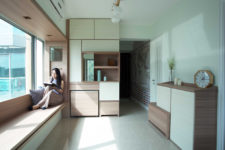 01 This minimalist apartment in Hong Kong is very functional and is built around bay windows