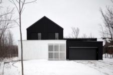 01 This modern chalet was inspired by local barns yet done in the modern black and white color scheme