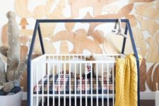 02 Gulliver cot by IKEA with a cool hack is ideal for this boy’s nursery