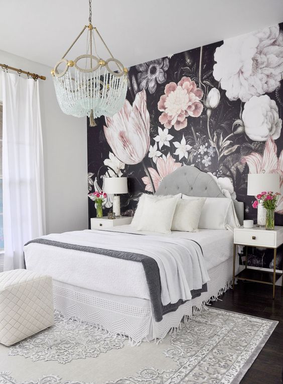 a statement wall for a girlish bedroom done with realistic floral wallpaper