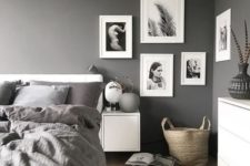 02 a stylish gallery wall with black and white pics for a monochrome space