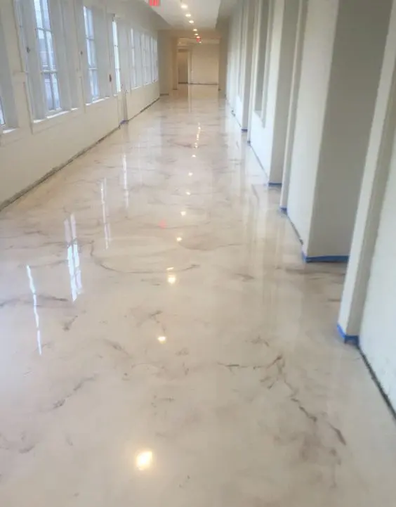 epoxy floors are often chosen for their amazing and bright look, here pearl metallic epoxy floors look wow