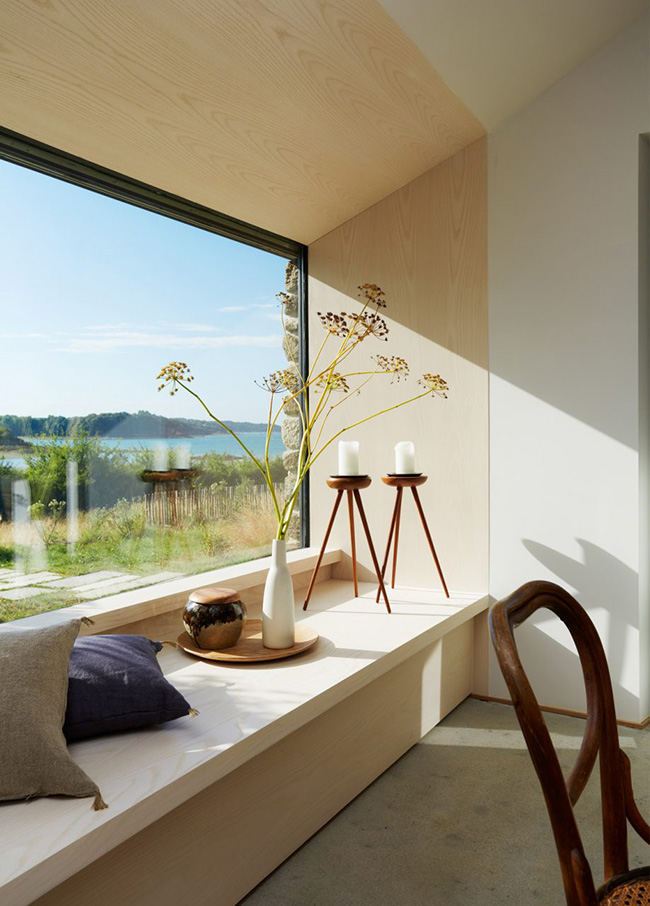 The large window shows amazing views and the windowsill can be used for storage and as a daybed