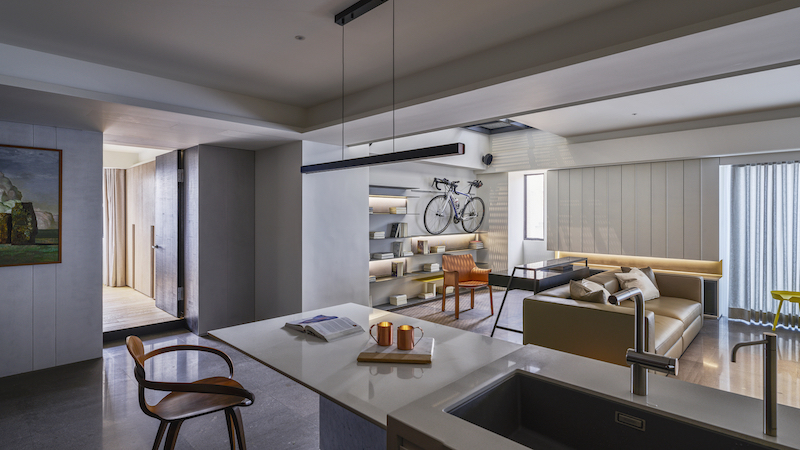 The most eye catchy feature here is a set of shelves with owners' favorite things and a bike rack