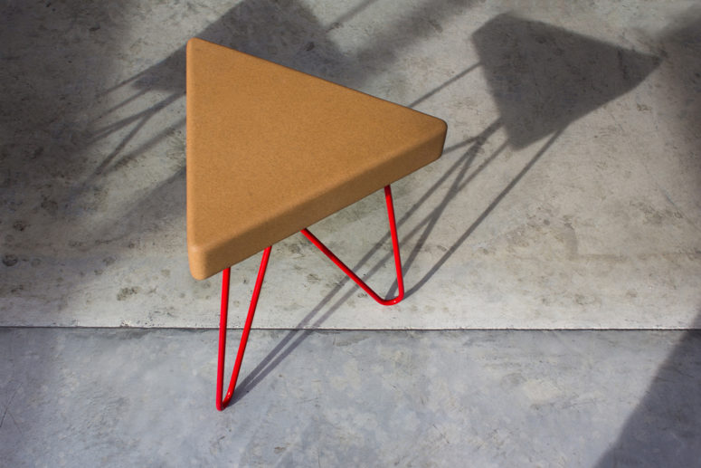 The stool's name is translated as 'three' as there are three sides and legs, the legs are hairpin ones, which is a hot trend