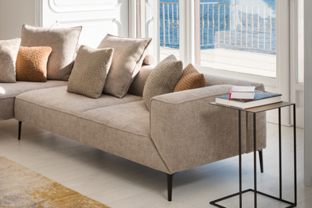 With soft tones and organic contours, high quality materials the sofa will be welcome in your living room