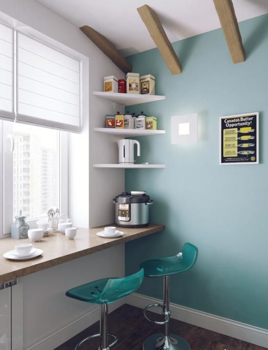 a modern breakfast space with bold turquoise chairs and a cork windowsill