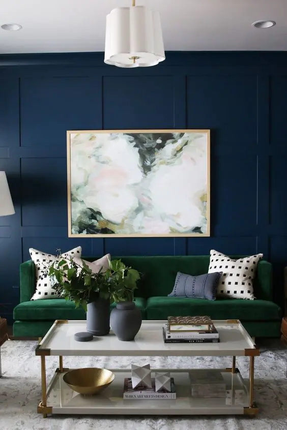 a watercolor abstract artwork contrasts the jewel tones of the room