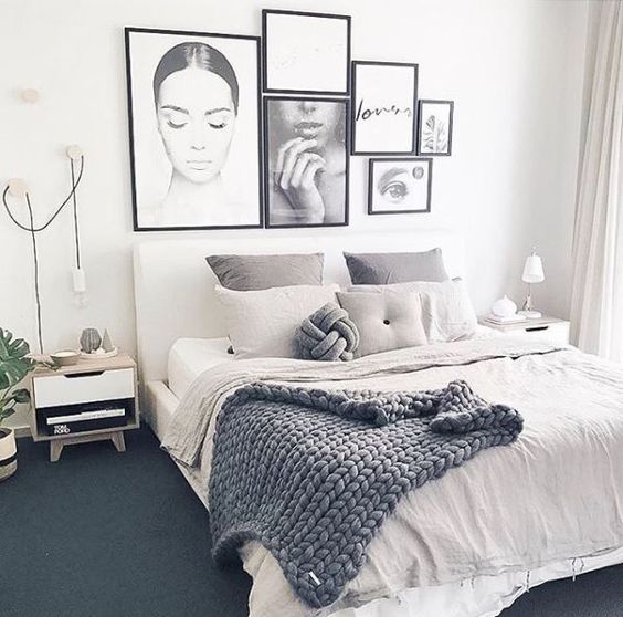 a gorgeous gallery wall in black and white with a girlish feel