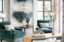 04 the oversized artwork matches the grey green chair upholstery
