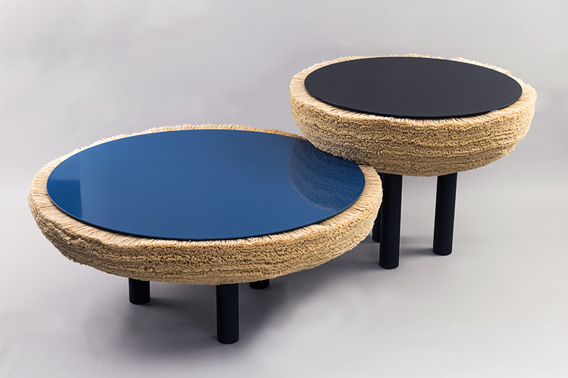 The coffee tables are done in black and blue and are also covered with fur